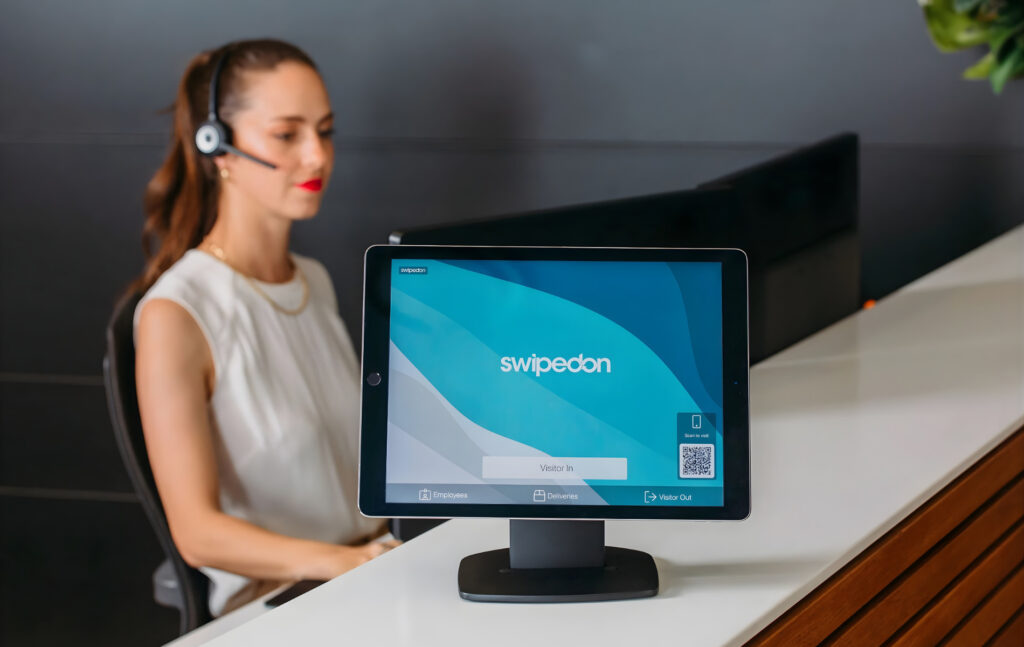 SwipedOn - visitor kiosk app mockup.