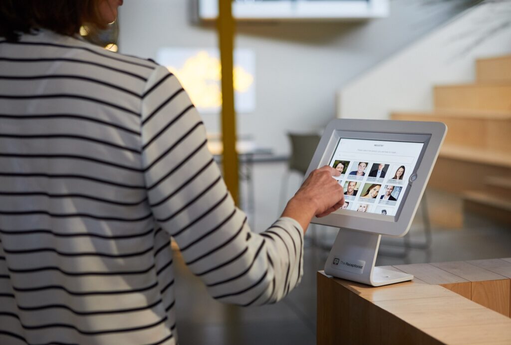 The Receptionist for iPad - visitor kiosk in use.